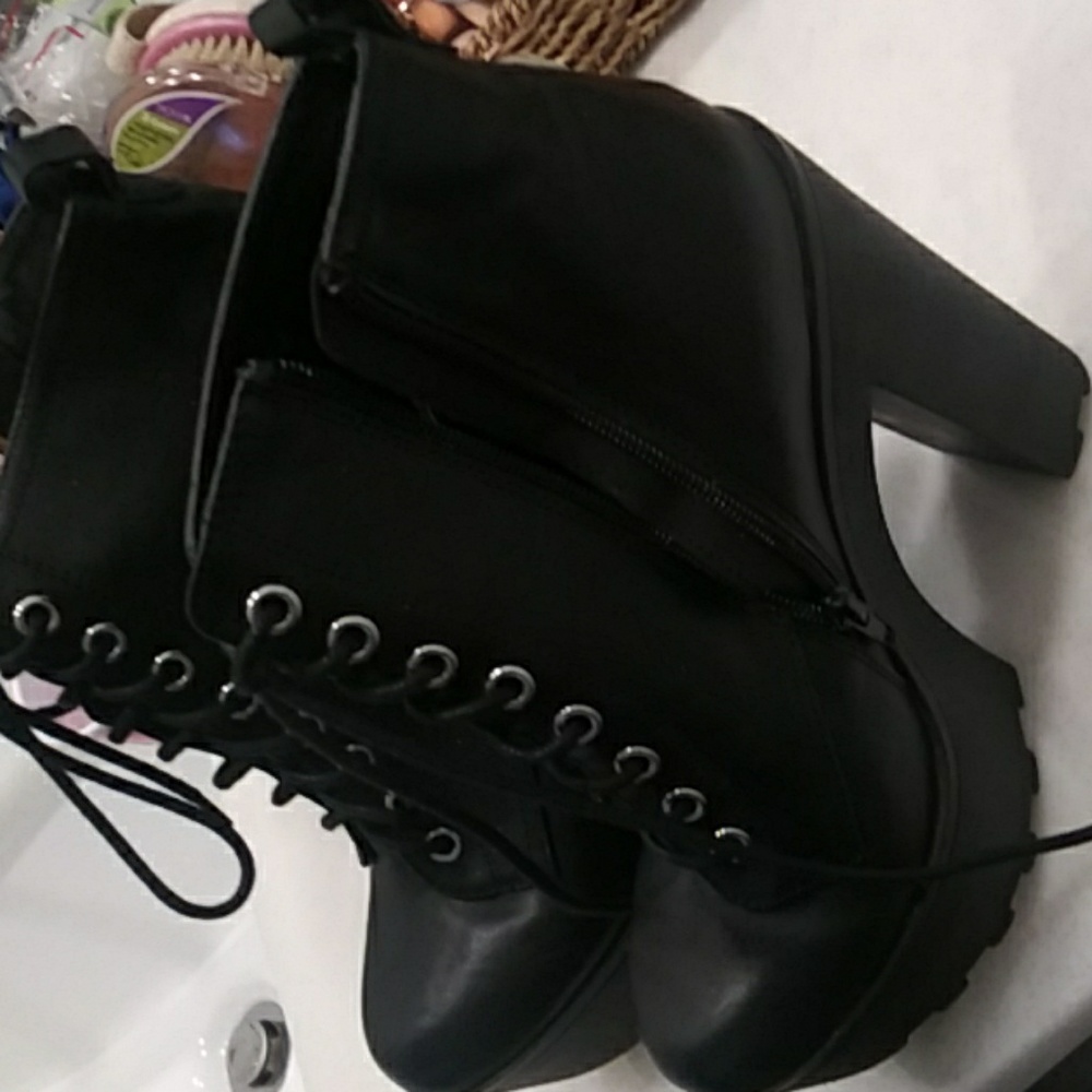 Black heels shaped like a boot